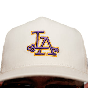 Snake Oil Provisions Key to LA Trucker Hat Lakers