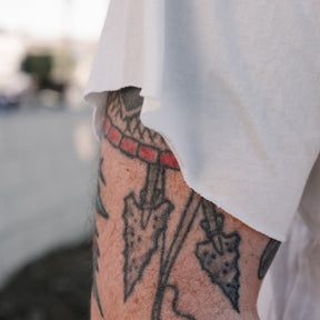 Schaeffer's Garment Hotel Cycle Varsity Drop Shoulder Raw Edge Tee White